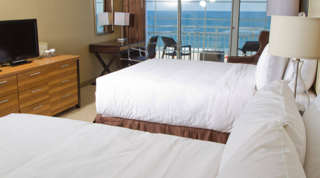 Ocean Club Hotel penthouse level room with two queen beds and full ocean view