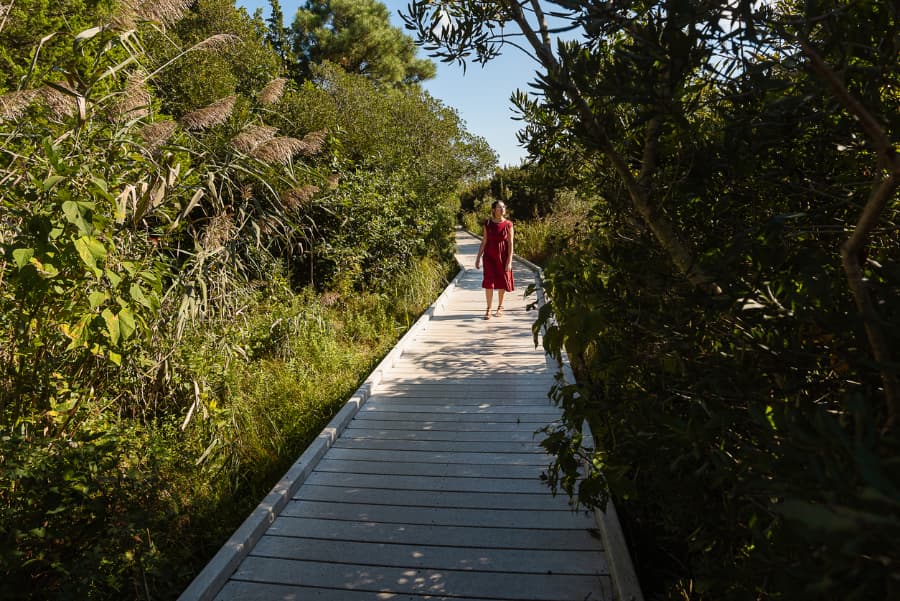 Guest strolling along nature trail in Cape May